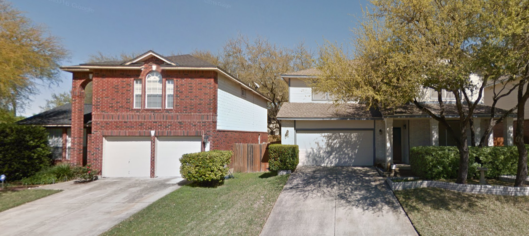 The front view of a house in San Antonio TX from the sidewalk