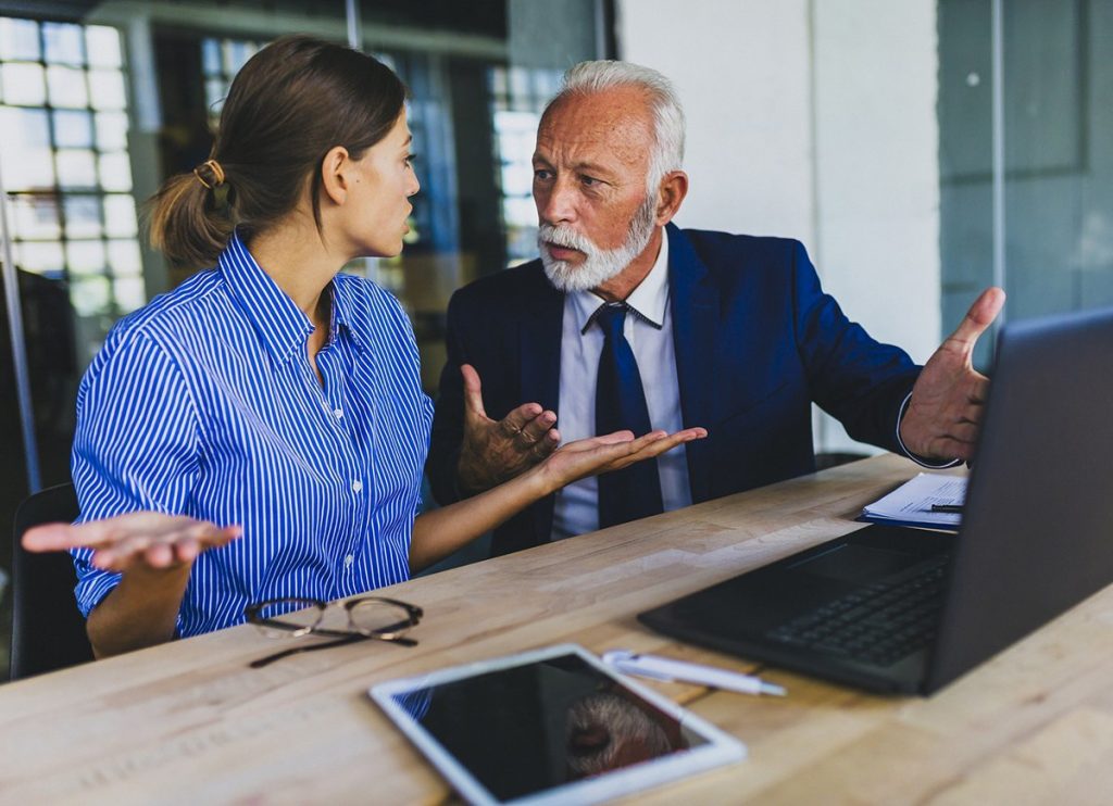 realtor having a discussion with his client